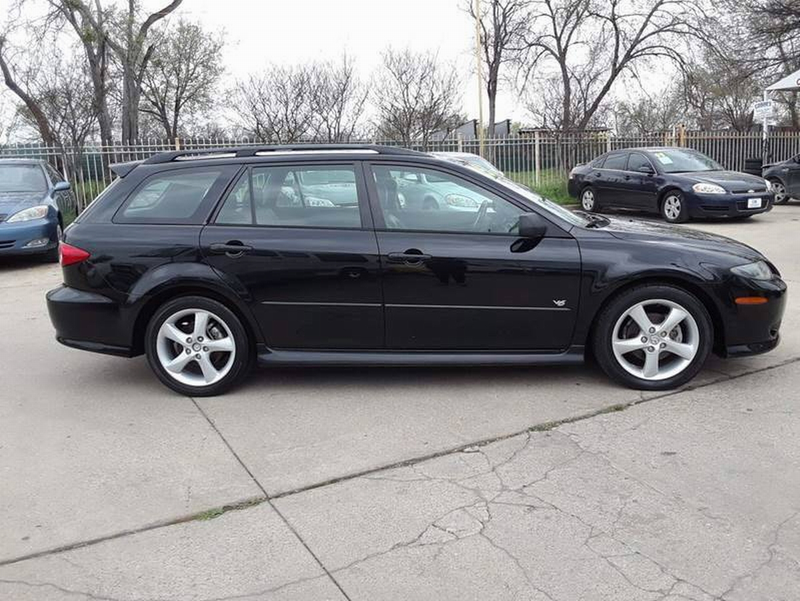 Illustration for article titled At $2,499, Could This Dimpled 2005 Mazda 6 Wagon Put a Dent in Your Wallet?